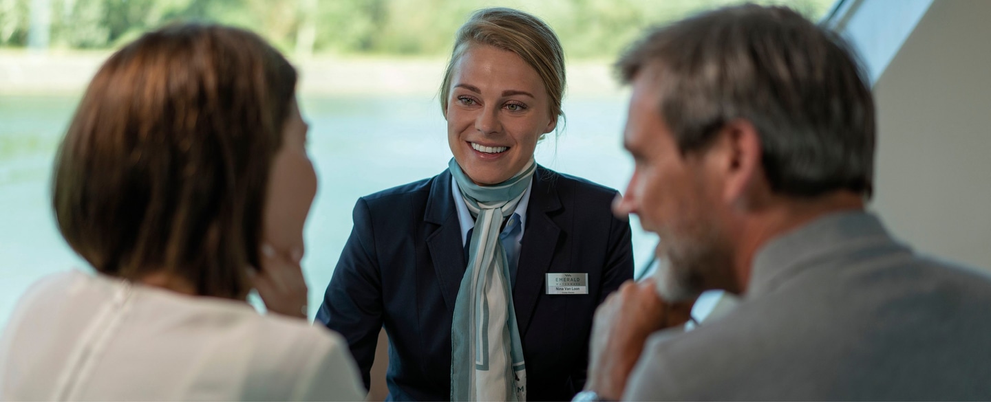 Two guests and cruise director