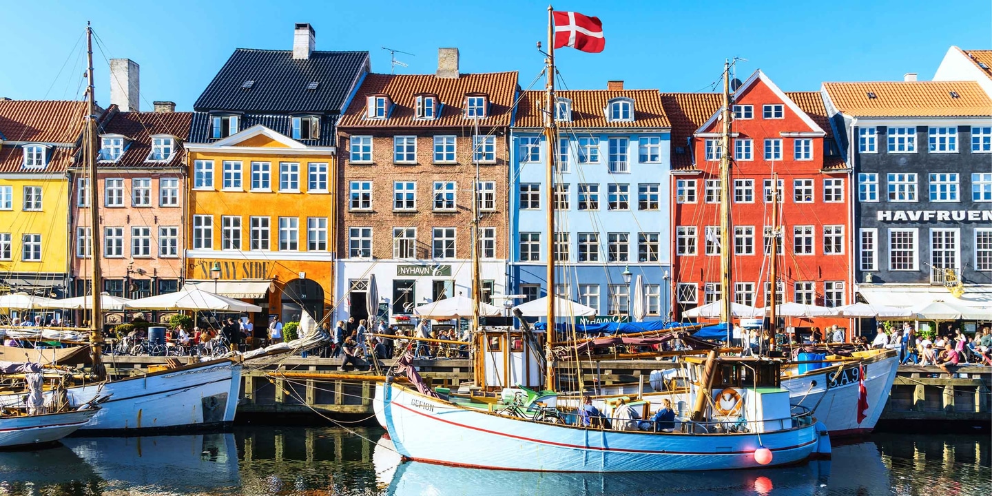 Aerial view of Copenhagen, Denmark with colourful buildings, canals, and boats